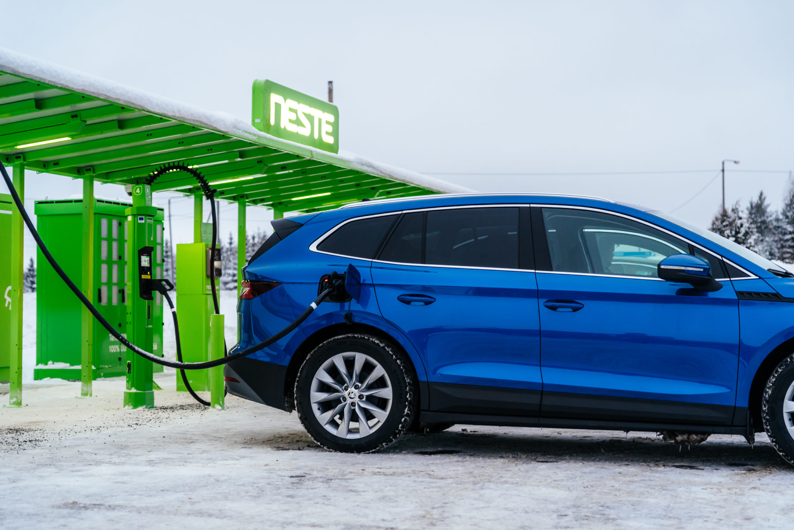 Car plugged in to ev charging station