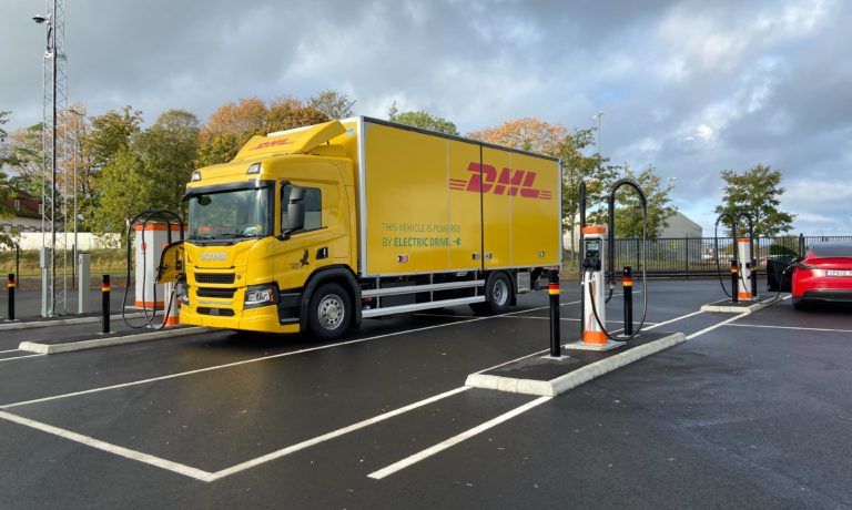 DHL electric truck charging at Kempower truck charging station Sweden